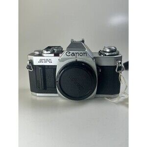 UNTESTED AS IS Canon AV-1 35mm SLR Film Camera Body, Silver/Black